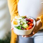 Pregnant woman choosing healthy foods rich in essential nutrients