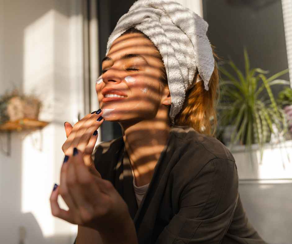 Mom taking a short self-care break at home—drinking water, journaling, or enjoying a quiet moment