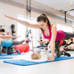 New mom practicing 10 Gentle Postpartum Exercises at home to rebuild strength safely