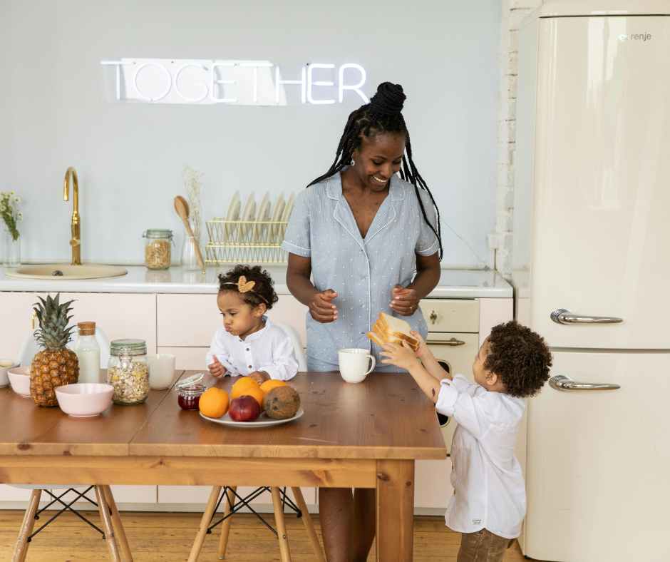 A bowl of colorful fruits, yogurt, and nuts prepared as an immune-boosting snack for kids.