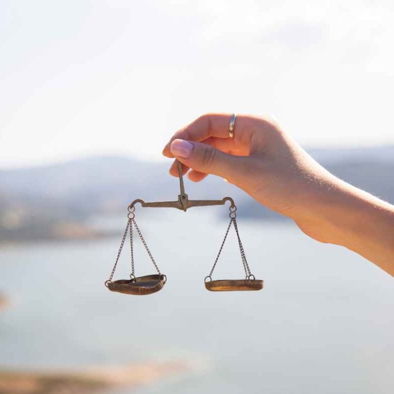 A postpartum mom enjoying a balanced meal and yoga session—Balancing Hormones Naturally.