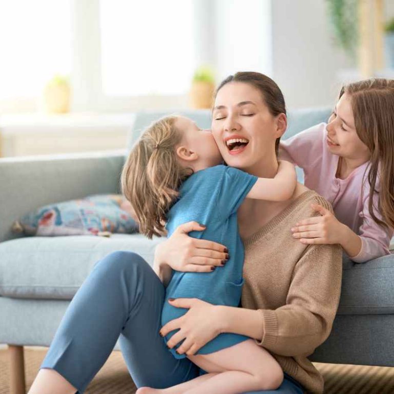 Parent and child using emotion cards together during playtime—building emotional intelligence in children at home.