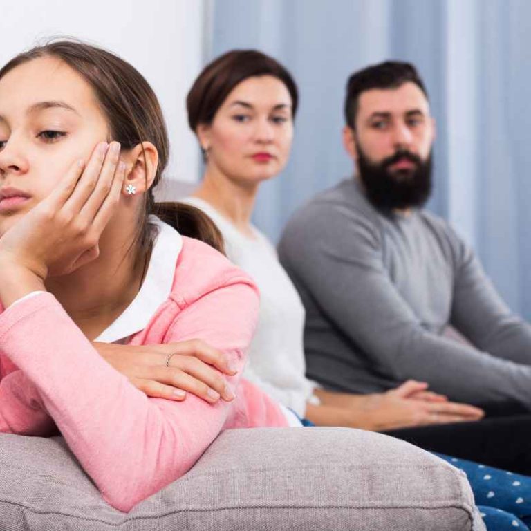 Calm parent setting healthy boundaries with their child during a bedtime routine—showing the power of saying no with love.